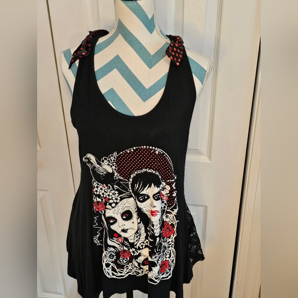 Black Sleeveless Top with Artistic Red and White Design